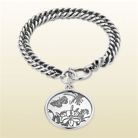 gucci flora cuff bracelet|Gucci charm bracelet in silver.